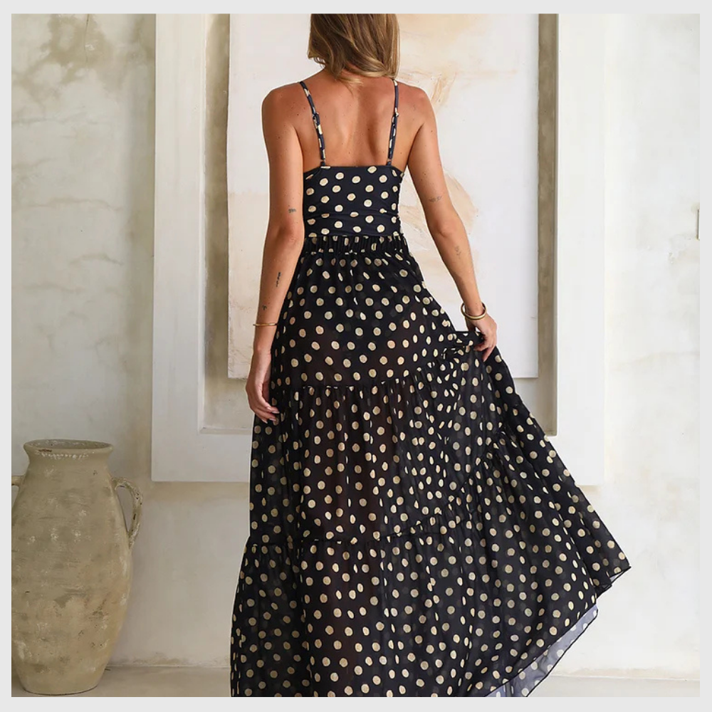 Maillot de bain une pièce à pois noirs et dorés avec col en V et jupe