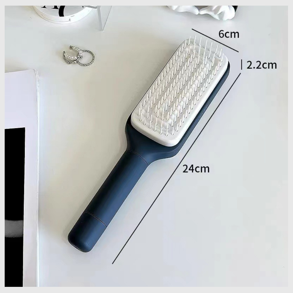 Brosse à cheveux autonettoyante