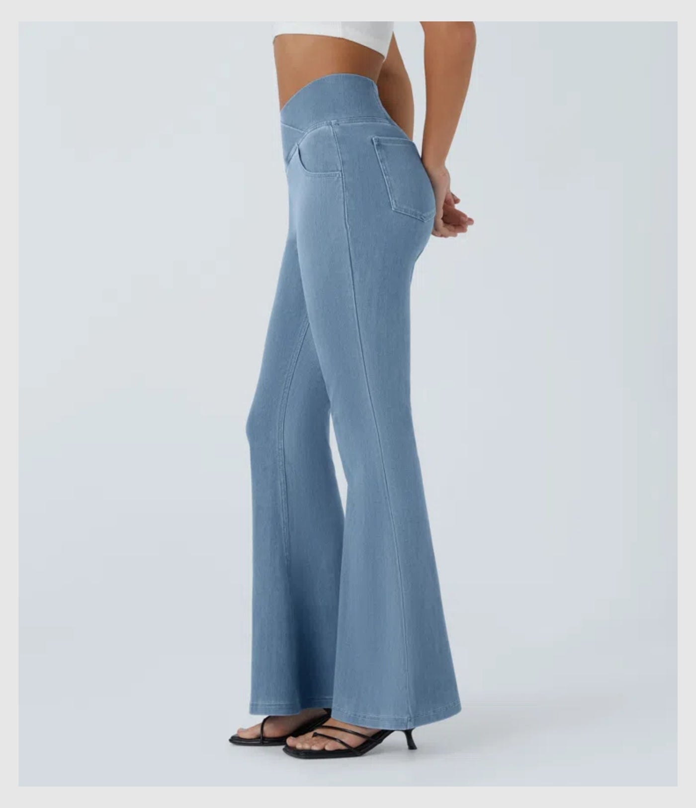 Pantalon évasé croisé taille haute en denim extensible