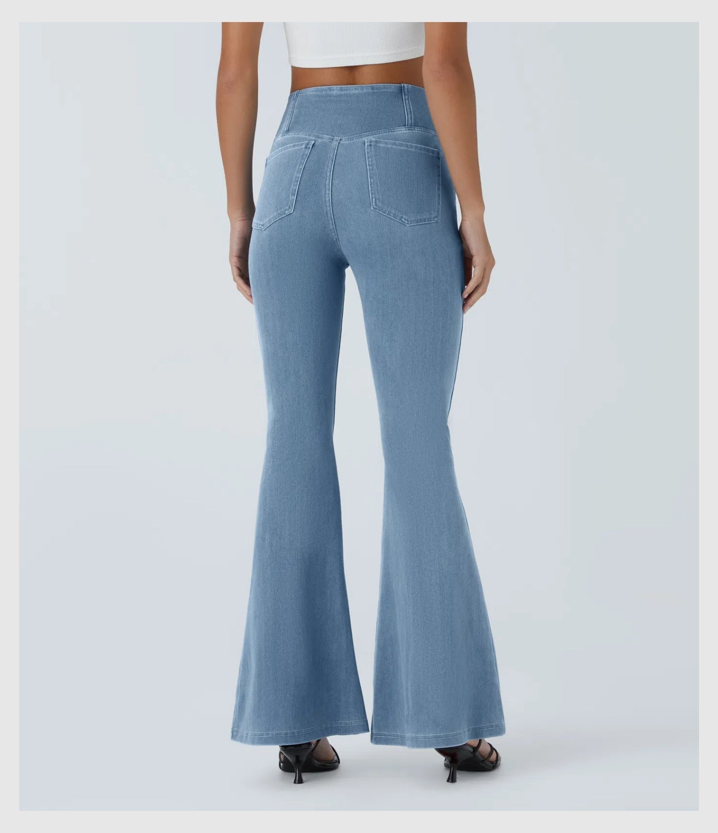 Pantalon évasé croisé taille haute en denim extensible