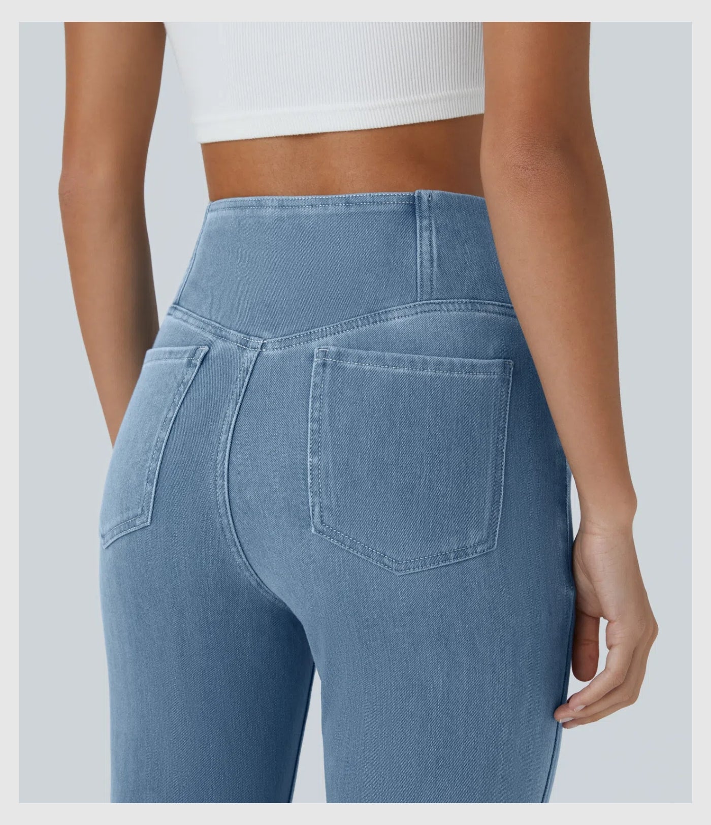 Pantalon évasé croisé taille haute en denim extensible
