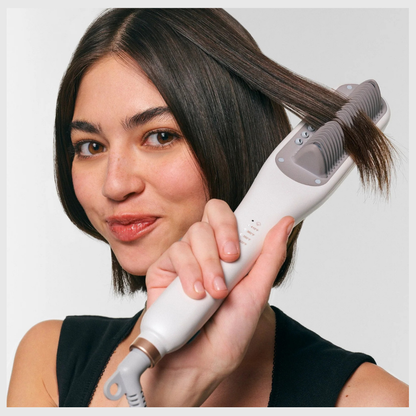 Peigne lisseur à vapeur domestique